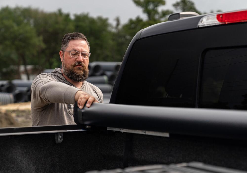 Pro X15 Tonneau Cover Black 2015-2027 Ford F-150 5 Foot 7 Inch Bed (Includes Lightning) Truxedo