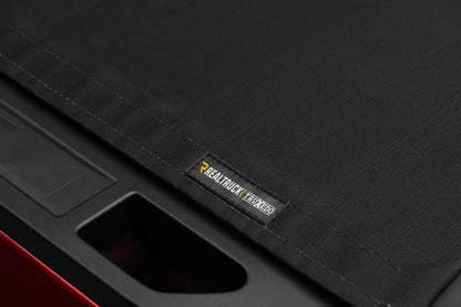 Sentry CT Tonneau Cover Black 2020-2026 GMC Sierra (with CarbonPro Bed) 5 Foot 9 Inch Bed Truxedo