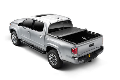 TruXport Tonneau Cover Black 1995-1998 Toyota T-100 X-Cab/1999-2006 Tundra 6 Foot 2 Inch Bed without Bed Caps Truxedo