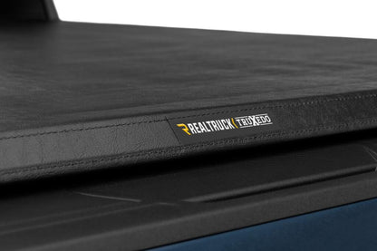 TruXport Tonneau Cover Black 2020-2027 Silverado/Sierra 2500 HD/3500 HD 6 Foot 9 Inch Bed Truxedo