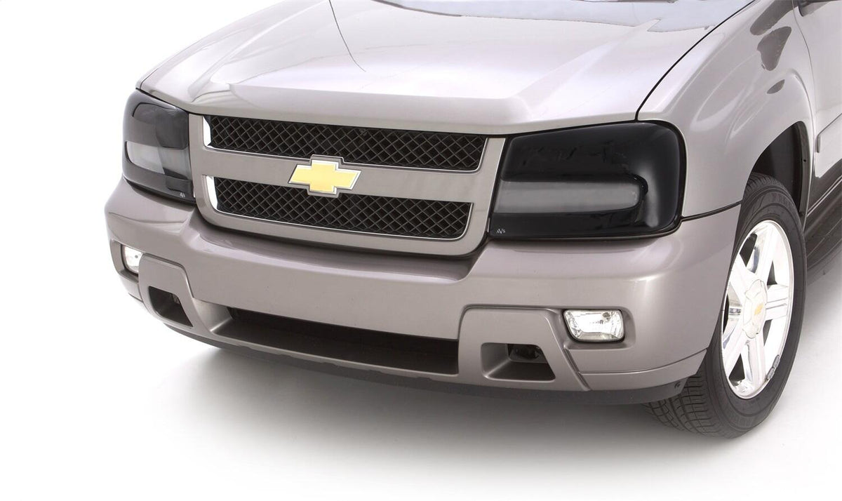 Headlight Covers for 2002-2009 Chevrolet Trailblazer Ext/Trailblazer Smoke Black Out 2pc. AVS