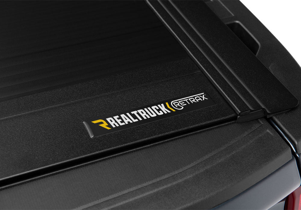 RetraxOne MX Retractable Tonneau Cover Matte One Piece Polycarbonate Finish 2020-2026 Silverado/Sierra 2500 HD/3500 HD 6' 9 inch Bed without Stake Pockets Standard Rails