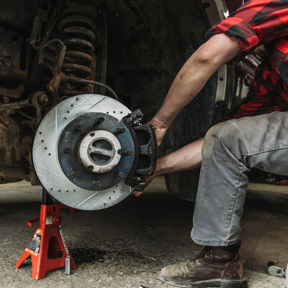 Doc's Diesel Ford 6.7L Powerstroke Ceramic Front Brake Pads + Drilled and Slotted Front Rotors Kit 2012-2024 F250, 2013-2024 F350, 2013-2016 F450