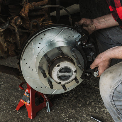 Doc's Diesel RAM 6.7L Cummins 2500/3500 Ceramic Front Brake Pads + Drilled and Slotted Front Rotors Kit 2009-2018
