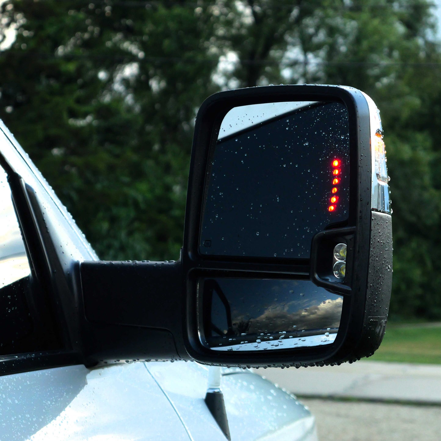 Close up of signal on glass on a 6th Gen Boost Auto Tow Mirror