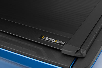 RetraxOne XR Retractable Tonneau Cover Matte One Piece Polycarbonate Construction 2022-2026 Toyota Tundra CrewMax 5' 7 inch Bed with Deck Rail System without Stake Pockets without Trail Special Edition Storage Boxes