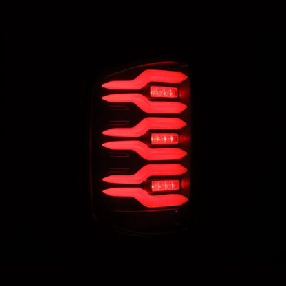 AlphaRex 14-18 Chevrolet Silverado Luxx-Series LED Tail Lights Black w/Activ Light/Seq Signal